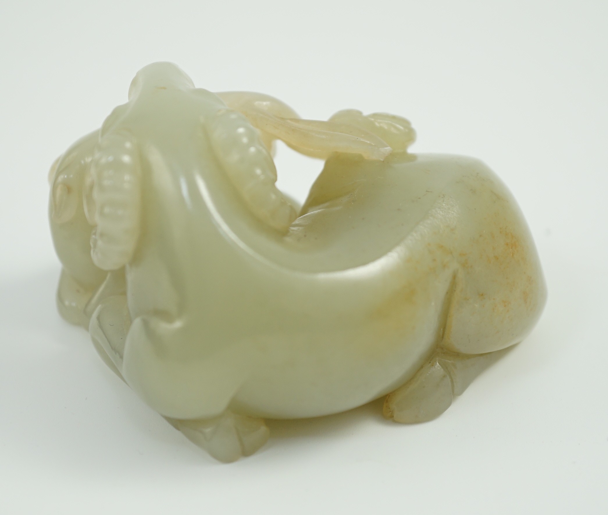 A Chinese pale celadon jade ram group, 7cm long